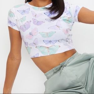 prettylittlething white butterfly crop t shirt